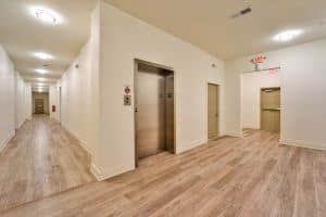 view of elevator and hallway
