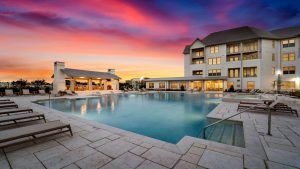 Poolside with luxury poolside lounge at sunset